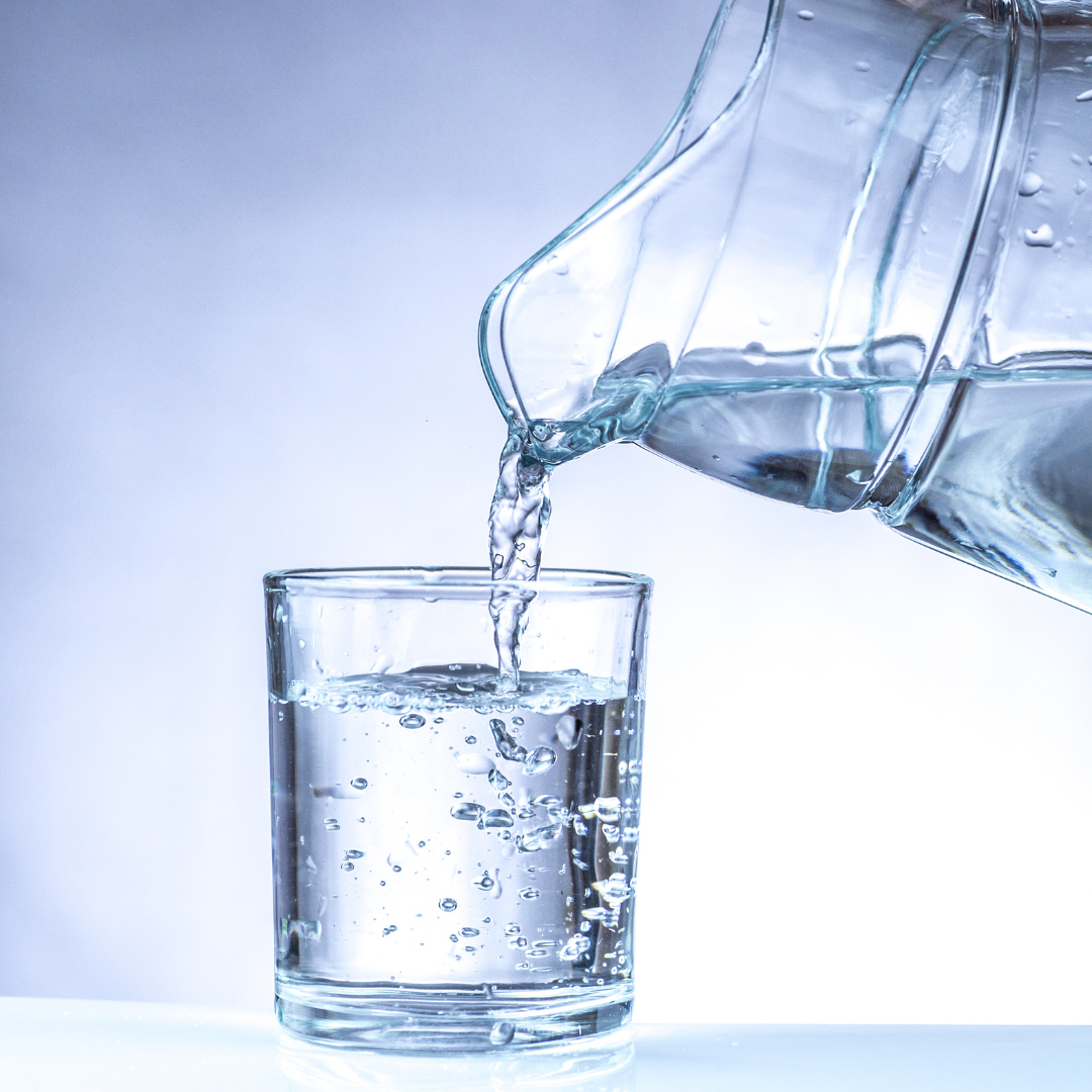 Image of purified water being poured into a glass
